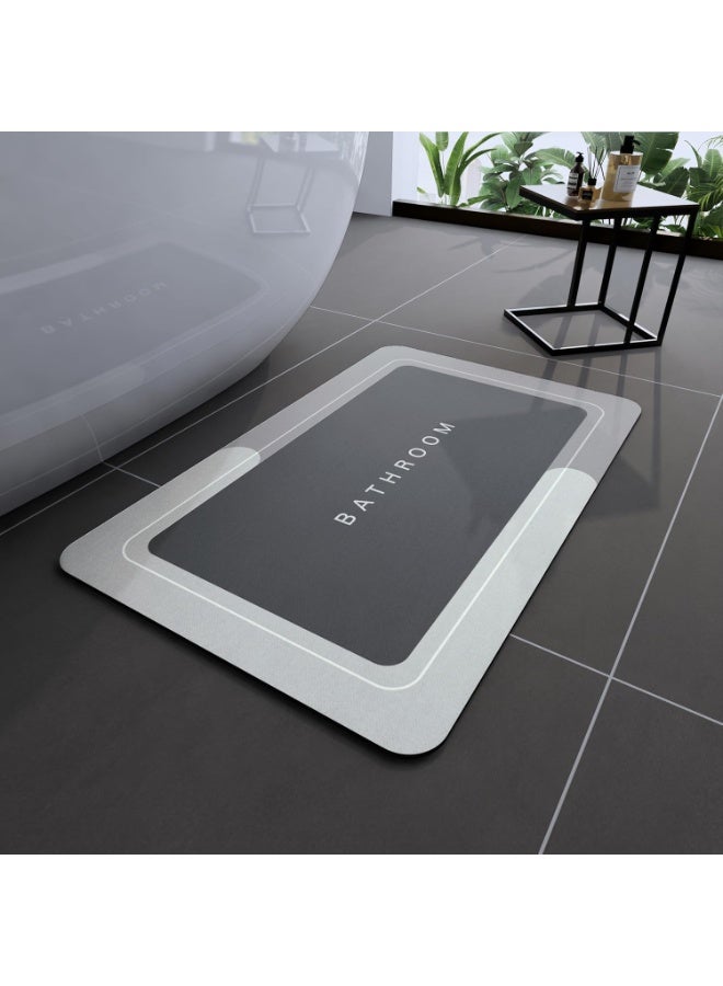 Luxury non-slip bathroom mat, multi-layered with superior water absorption and a rubberized surface. Bathroom mat suitable for bathroom and kitchen floors. Comes in (multiple colors randomly). - Image 1